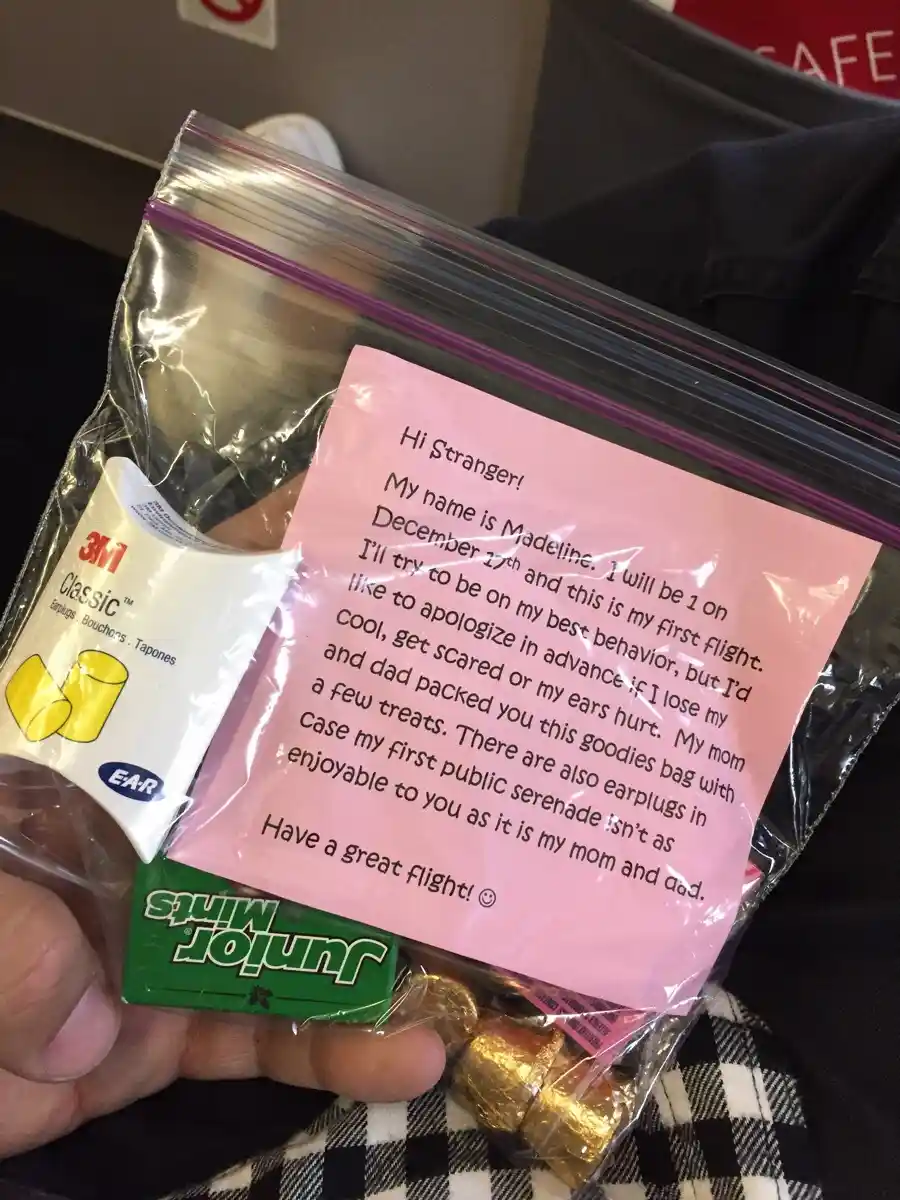 A baby just handed me this on my flight, and honestly, I can't be upset about it.