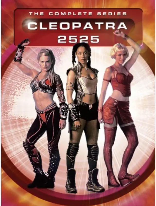 A promotional poster for the TV show 'Cleopatra 2525' features three women in futuristic, stylized outfits posing…