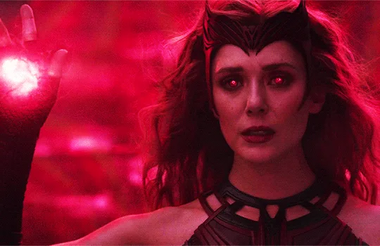 A composite image of six panels showing the character Wanda Maximoff from the movie 'Avengers: Infinity War' or…