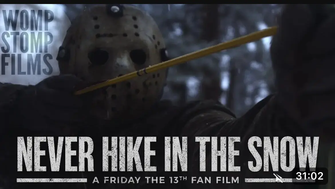 A still from a fan film shows Jason Voorhees from Friday the 13th holding a yellow arrow, with the text 'NEVER HIKE IN THE…