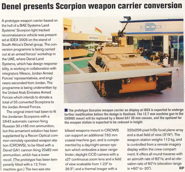 A newspaper article about a Denel Scorpion weapon carrier prototype, featuring a photo of the tan armored vehicle with a…