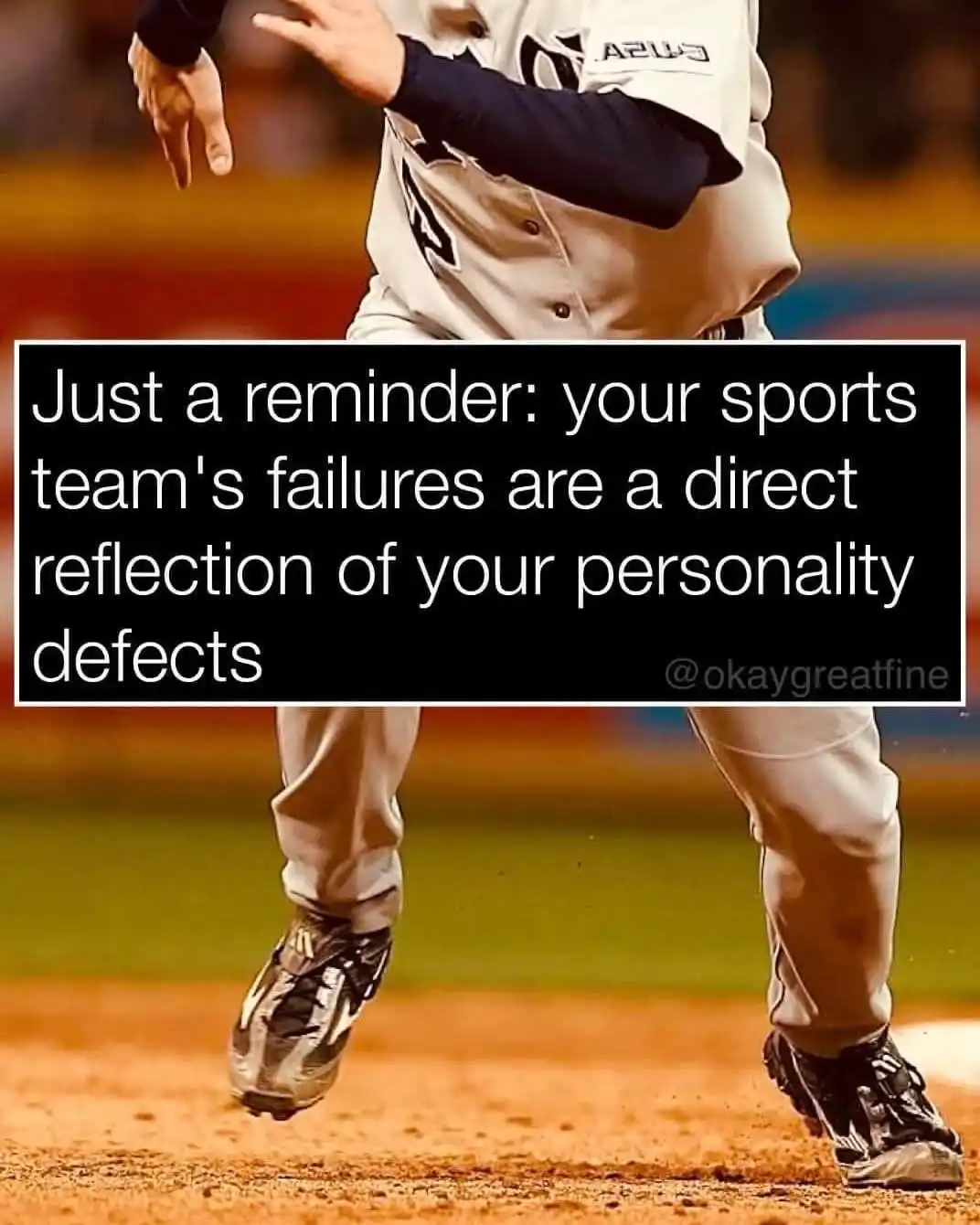 A cropped image of a baseball player in mid-stride on a dirt field, wearing a white uniform with black undersleeves and…
