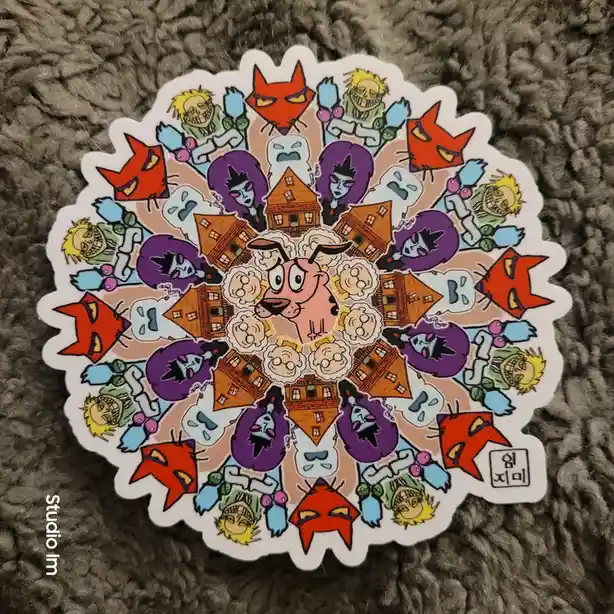 A circular sticker features a symmetrical mandala pattern of cartoon characters from the animated series 'The Grim…