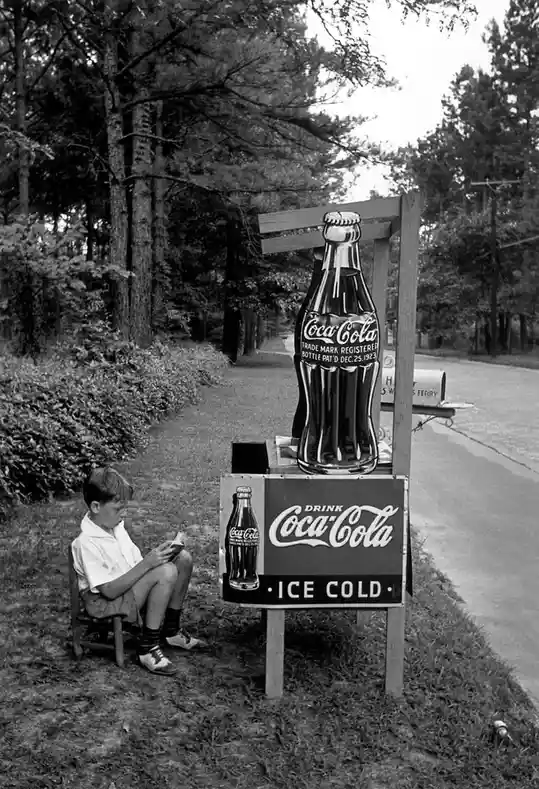Little Boy Selling Coca-Cola in 1936: A Glimpse into the Past