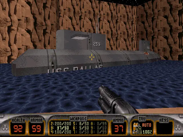 A screenshot from the 1994 video game Quake shows a first-person view of a player holding a shotgun, looking at a large gray…