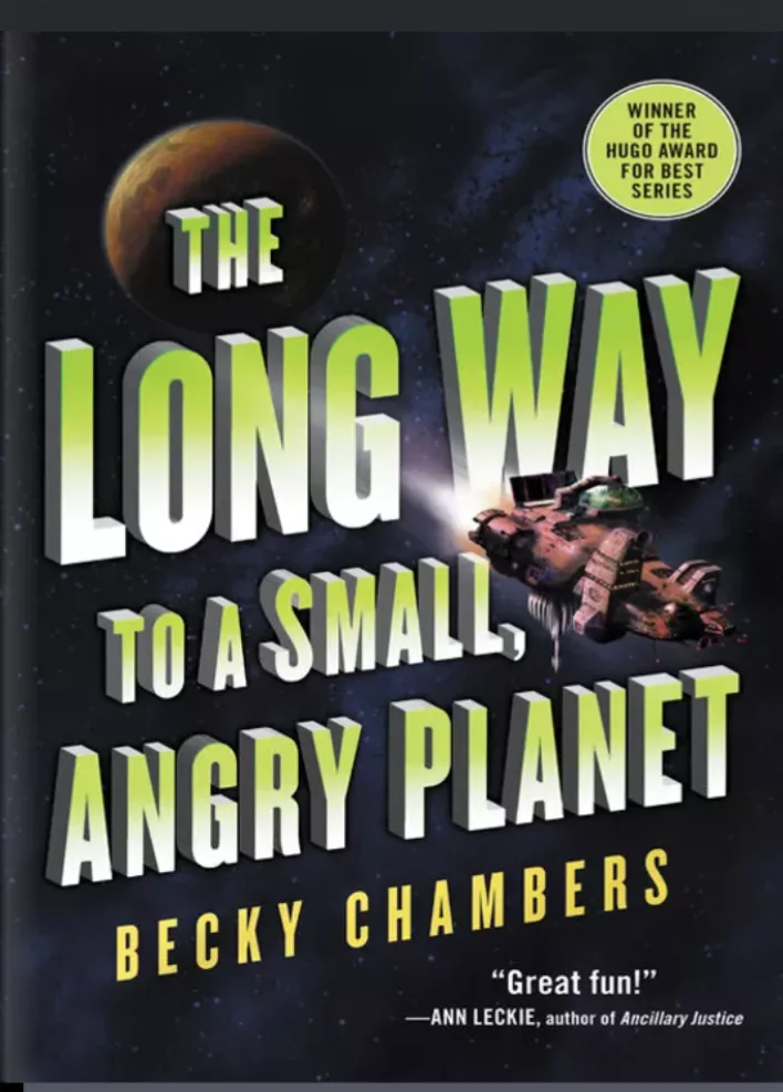The image shows the cover of Becky Chambers' book 'The Long Way to a Small, Angry Planet,' featuring a spaceship flying…