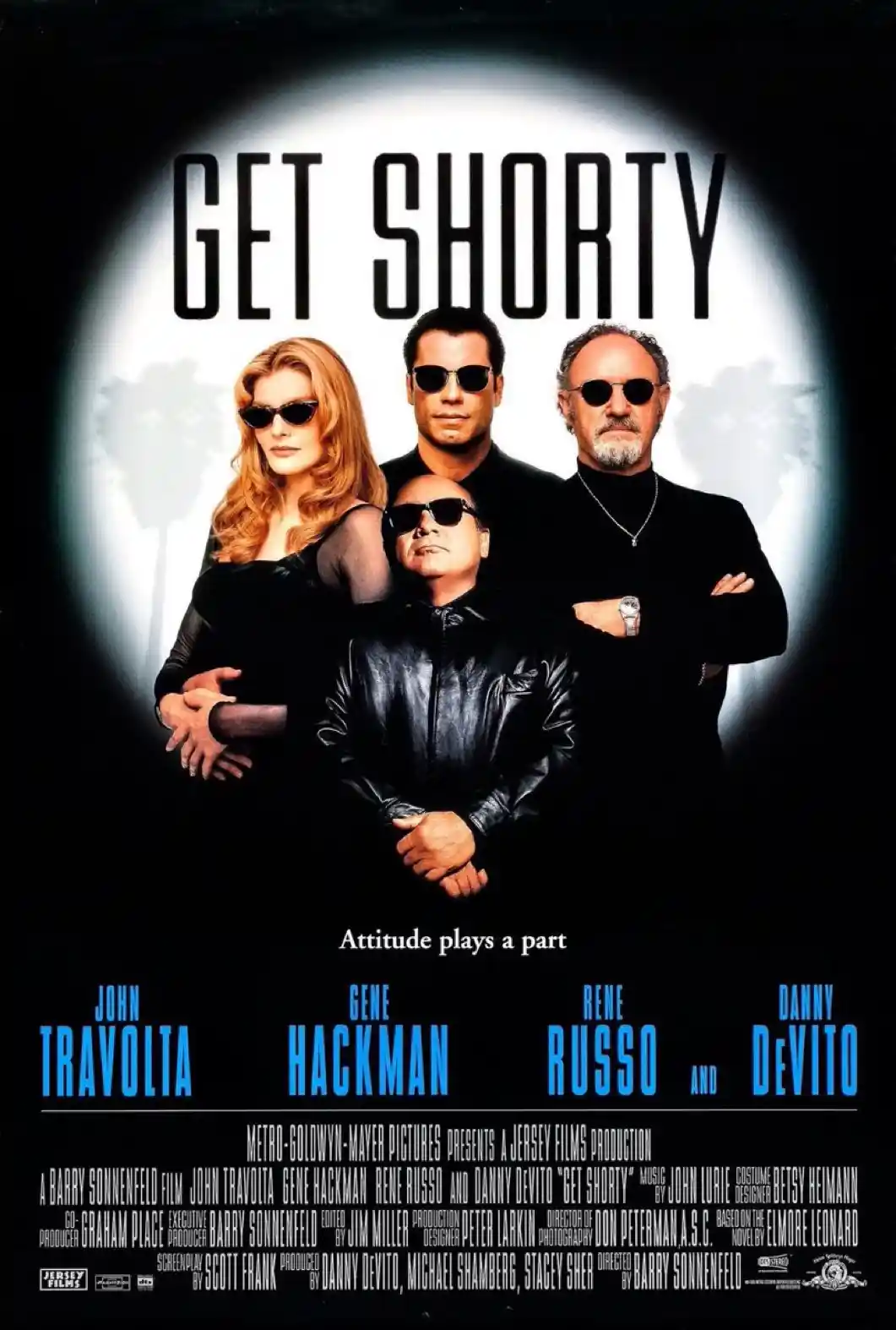A movie poster for 'Get Shorty' featuring four actors—John Travolta, Gene Hackman, Rene Russo, and Danny DeVito—all wearing…