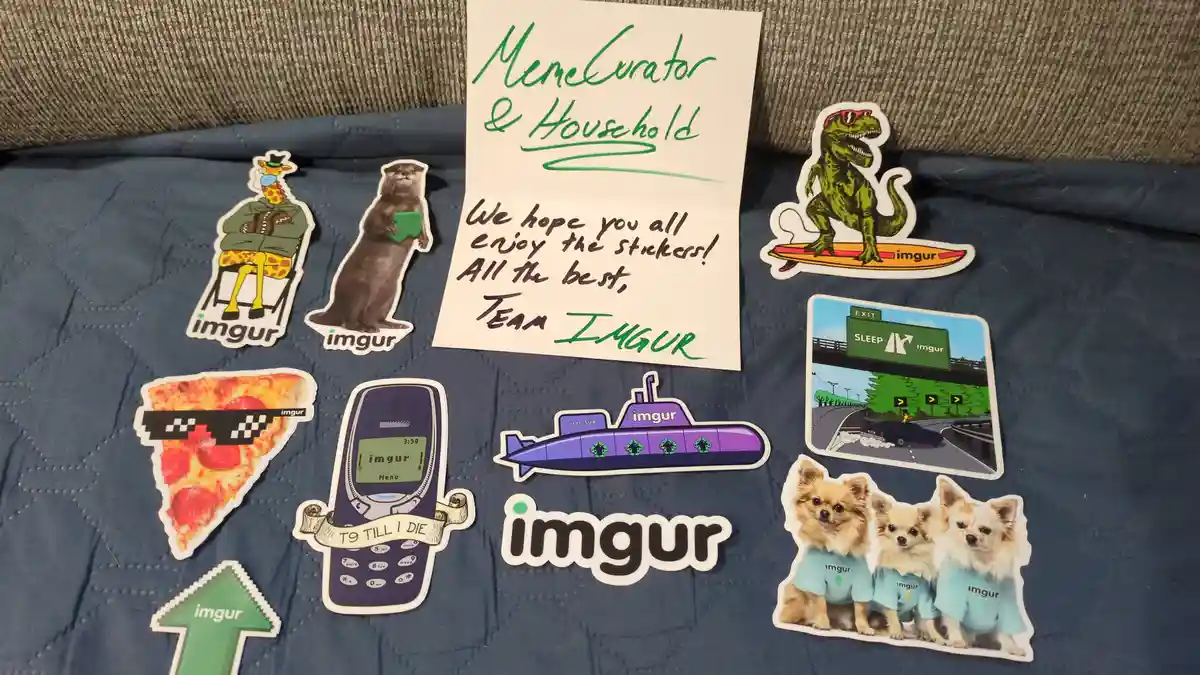 A collection of Imgur-branded stickers, including a giraffe in a hat, an otter holding a mug, a T-Rex on a surfboard, a…