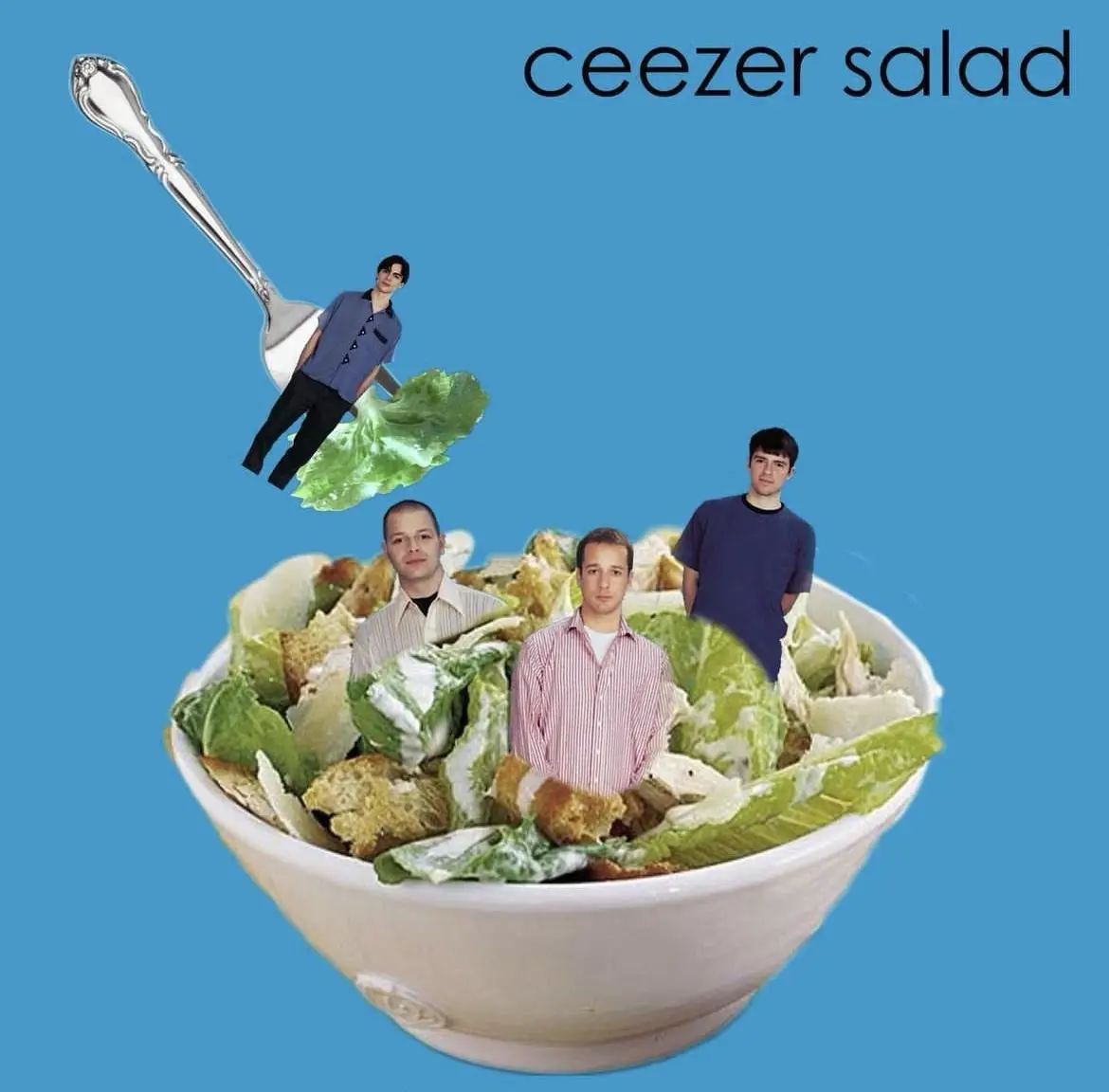A surreal image shows four men photoshopped into a bowl of Caesar salad; one man stands on a lettuce leaf atop a large…