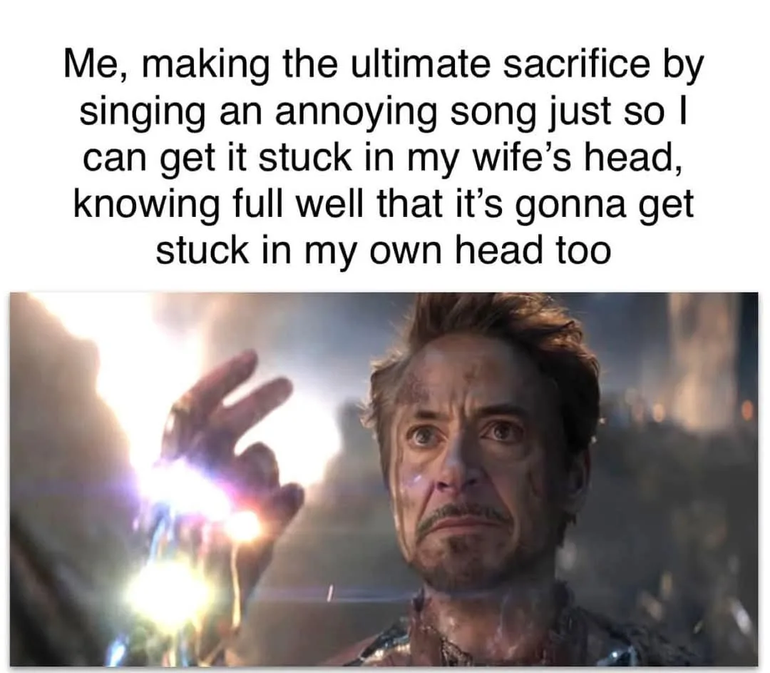 The image shows Tony Stark (Robert Downey Jr.) from 'Avengers: Endgame' holding the Infinity Gauntlet, looking solemn and…