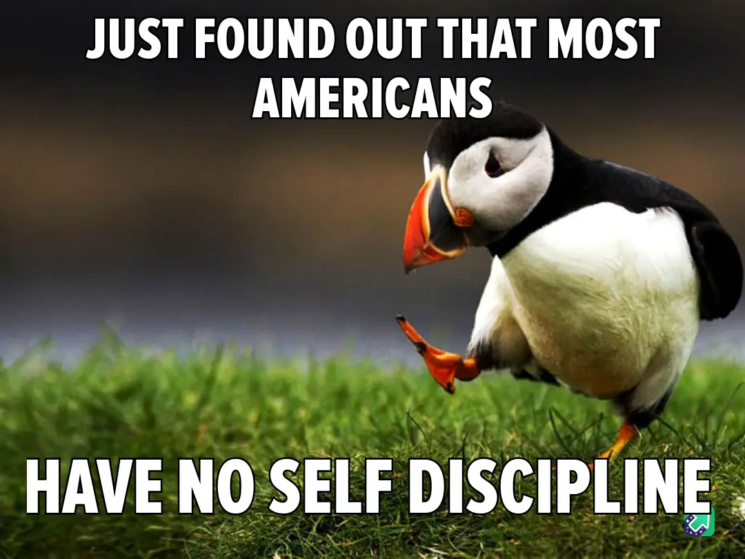 A puffin stands on green grass with one foot lifted, looking sideways. White bold text at the top reads 'JUST FOUND OUT THAT…