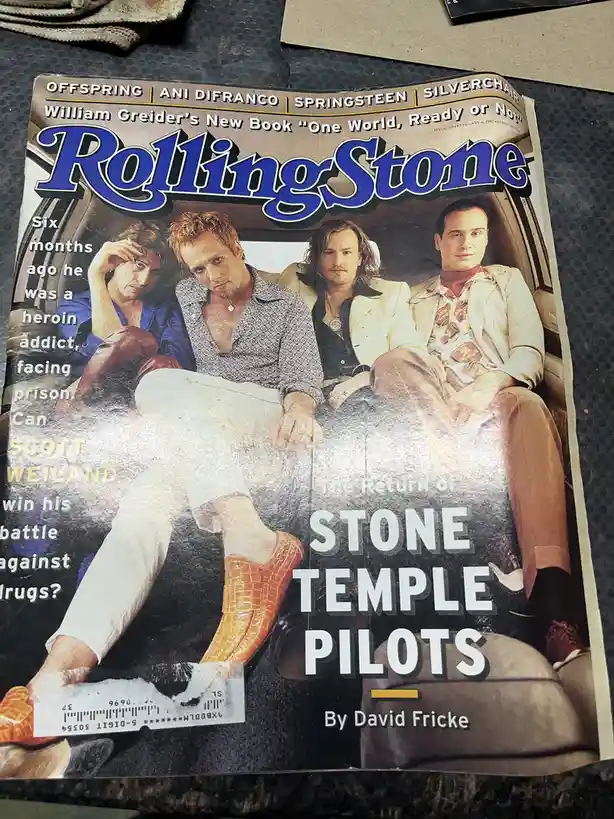 A 1997 Rolling Stone magazine cover featuring the band Stone Temple Pilots sitting in a car, with the headline 'The Return…