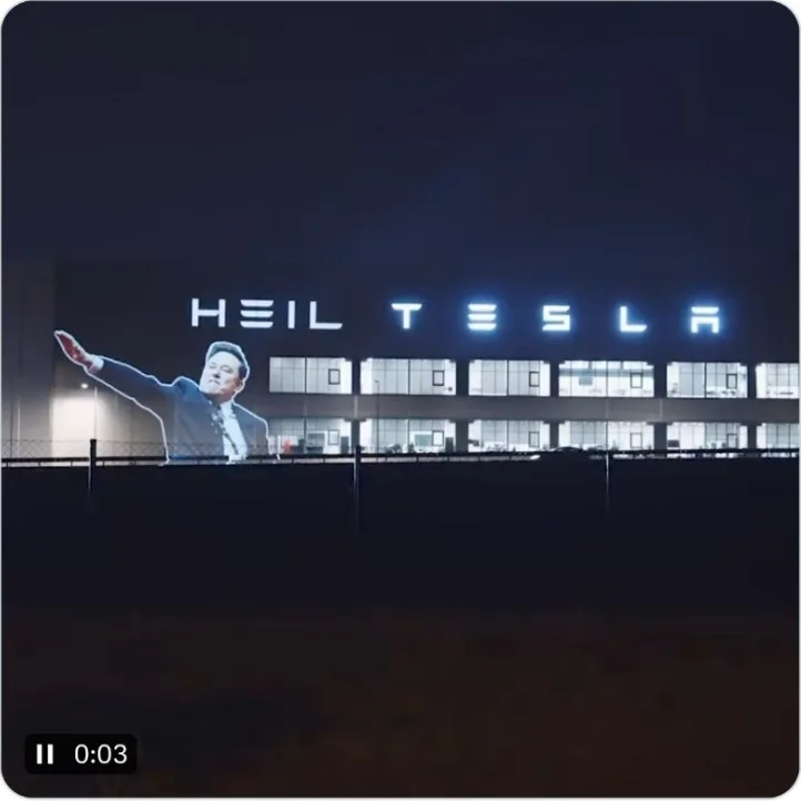 Activists shine a light on Musk's alleged salute at the Tesla factory in Germany!